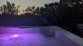 Maison avec terrasse et jacuzzi extérieur